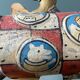 Old painted sheet metal pendulum toy