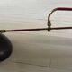 Adjustable wall lamp in black lacquered iron and brass, Italy, circa 1950