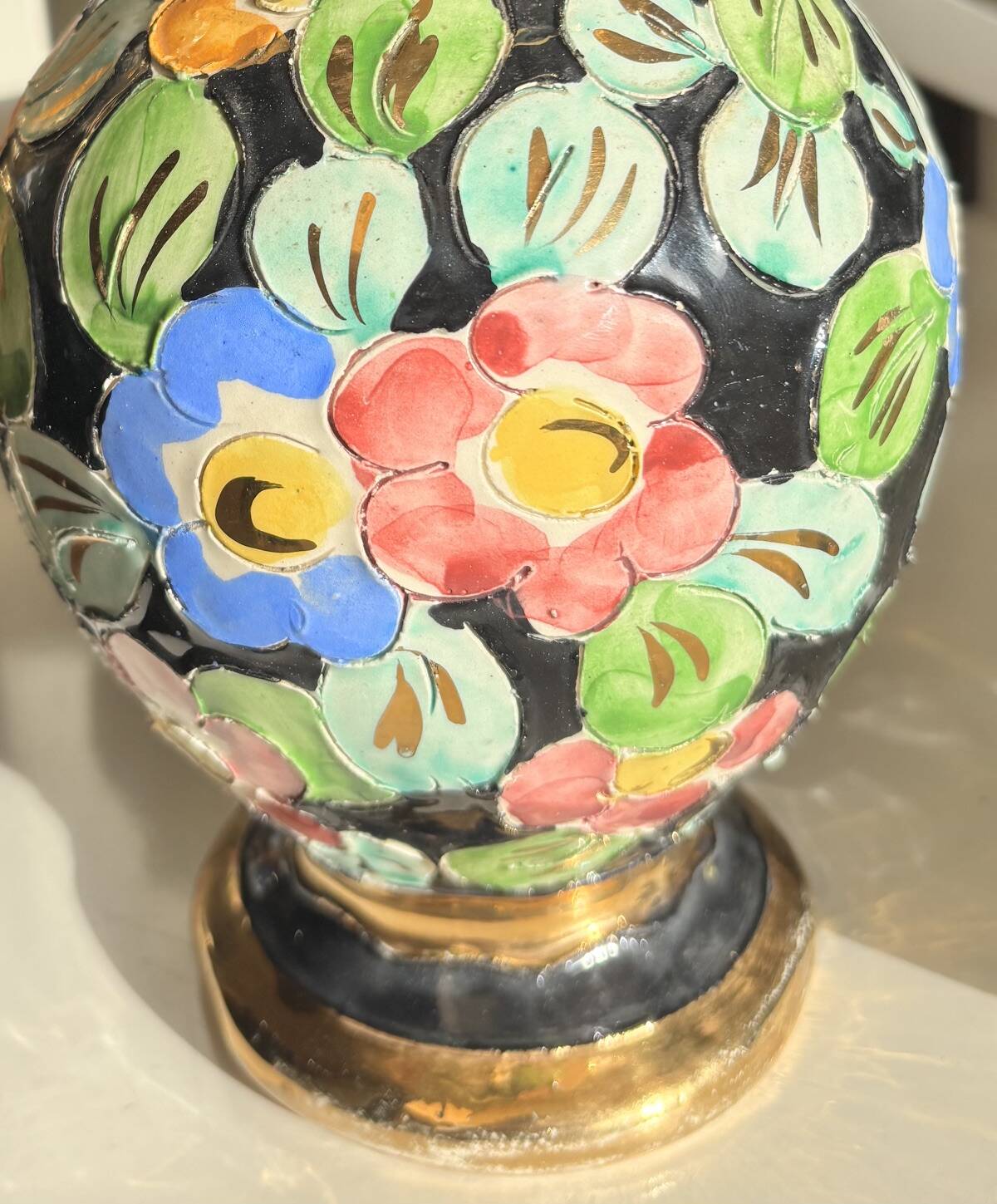 Large vintage ceramic jug from Vallauris, floral decoration and gilding.