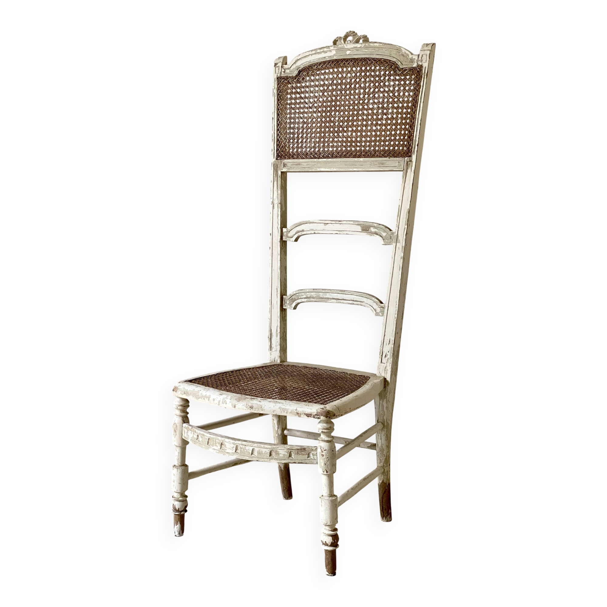 Nineteenth-century nursing chair, Napoleon III style, caned and patinated.