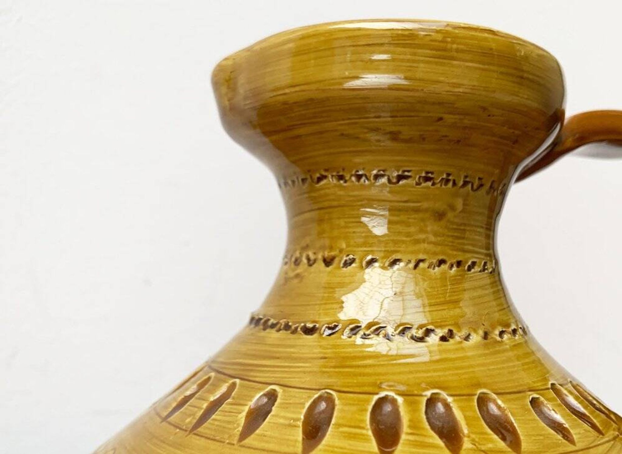 Italian pottery carafe from the mid-century by Aldo Londi for Bitossi, 1960s.