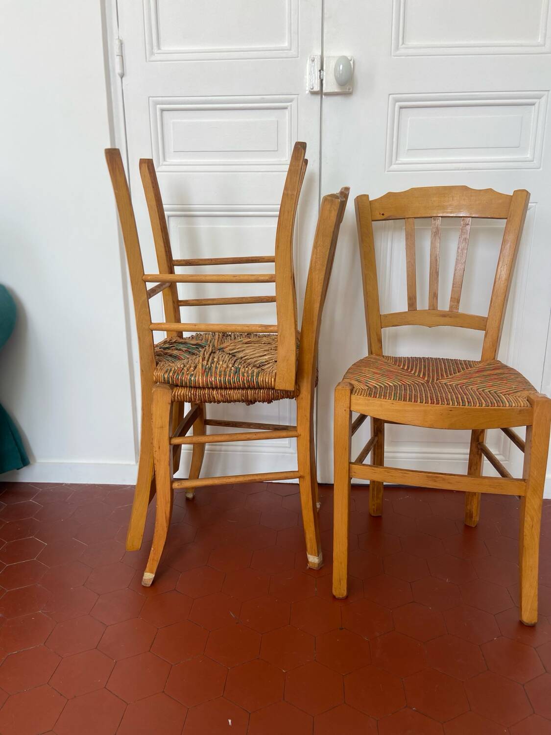 Trio of vintage straw/colored chairs