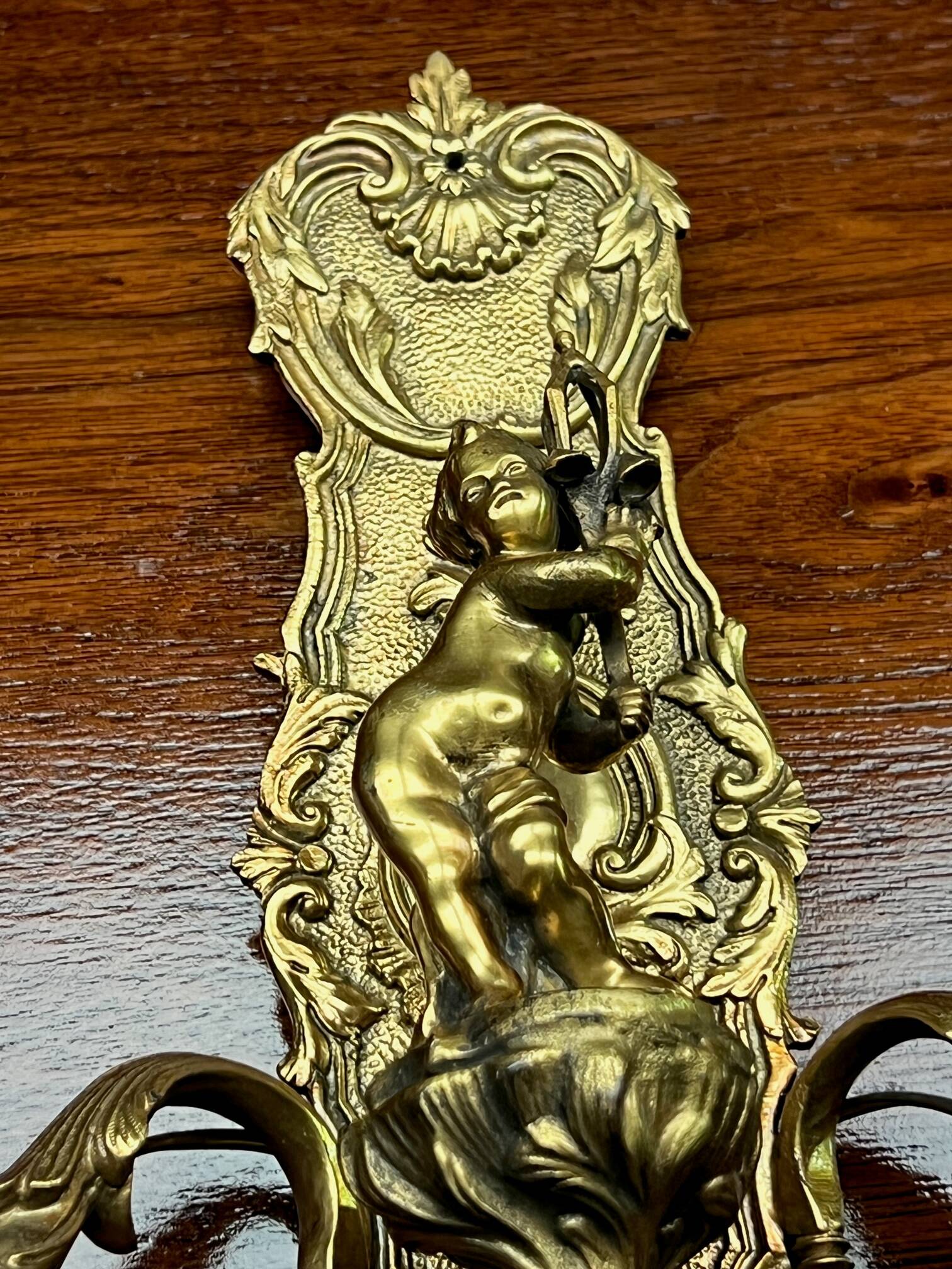 Pair of Louis XV style wall lights. Solid gilded bronze.