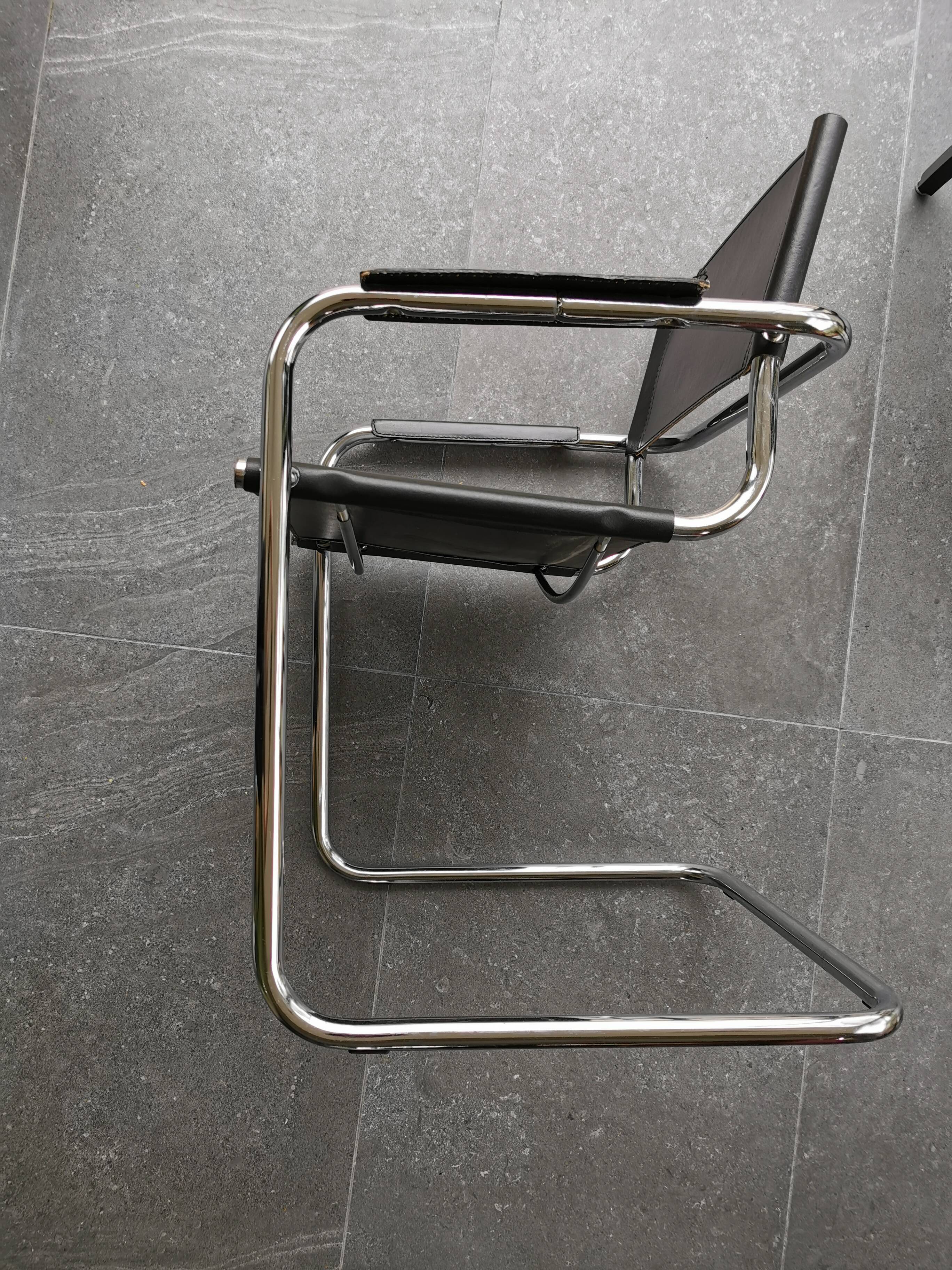 Metal and black leather design armchair pair