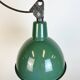 Industrial green enamel factory lamp with cast iron top, 1960s