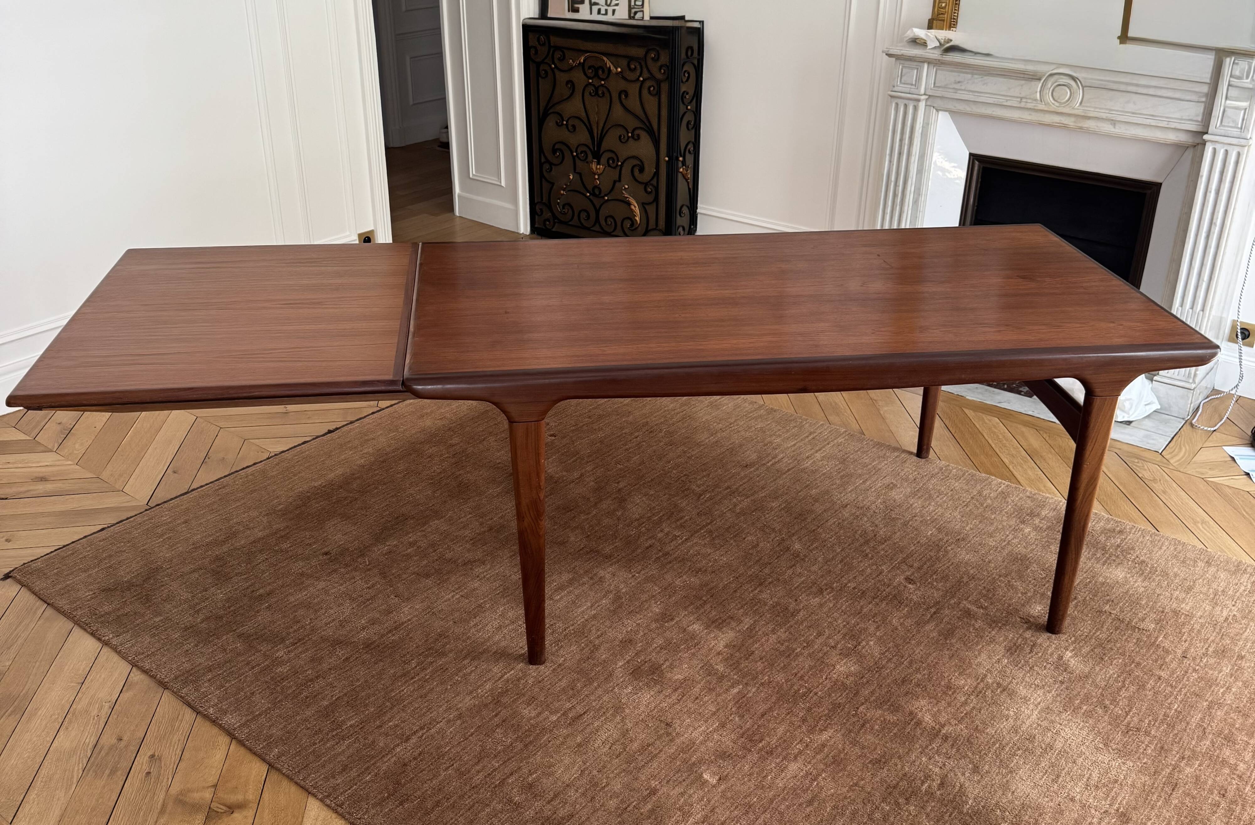 Dining table with extension by Johannes Andersen for Uldum Møbelfabrik