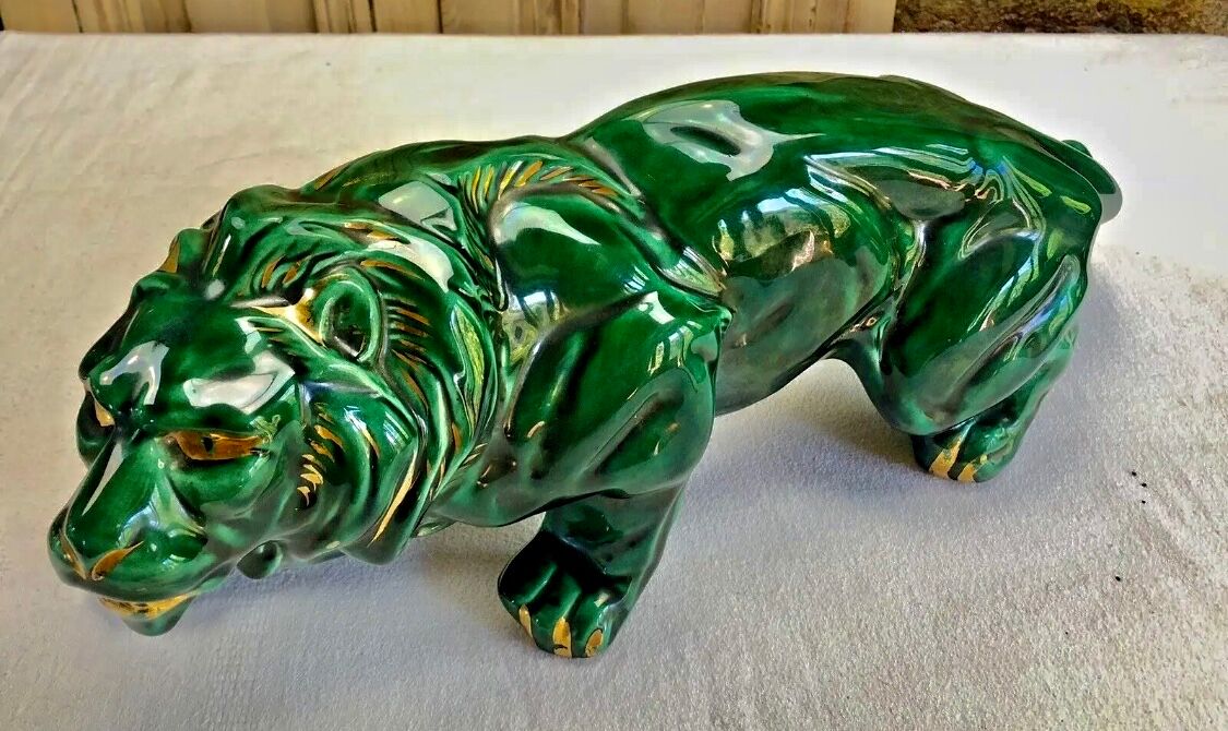 Art Deco lion statue cracked St Clement