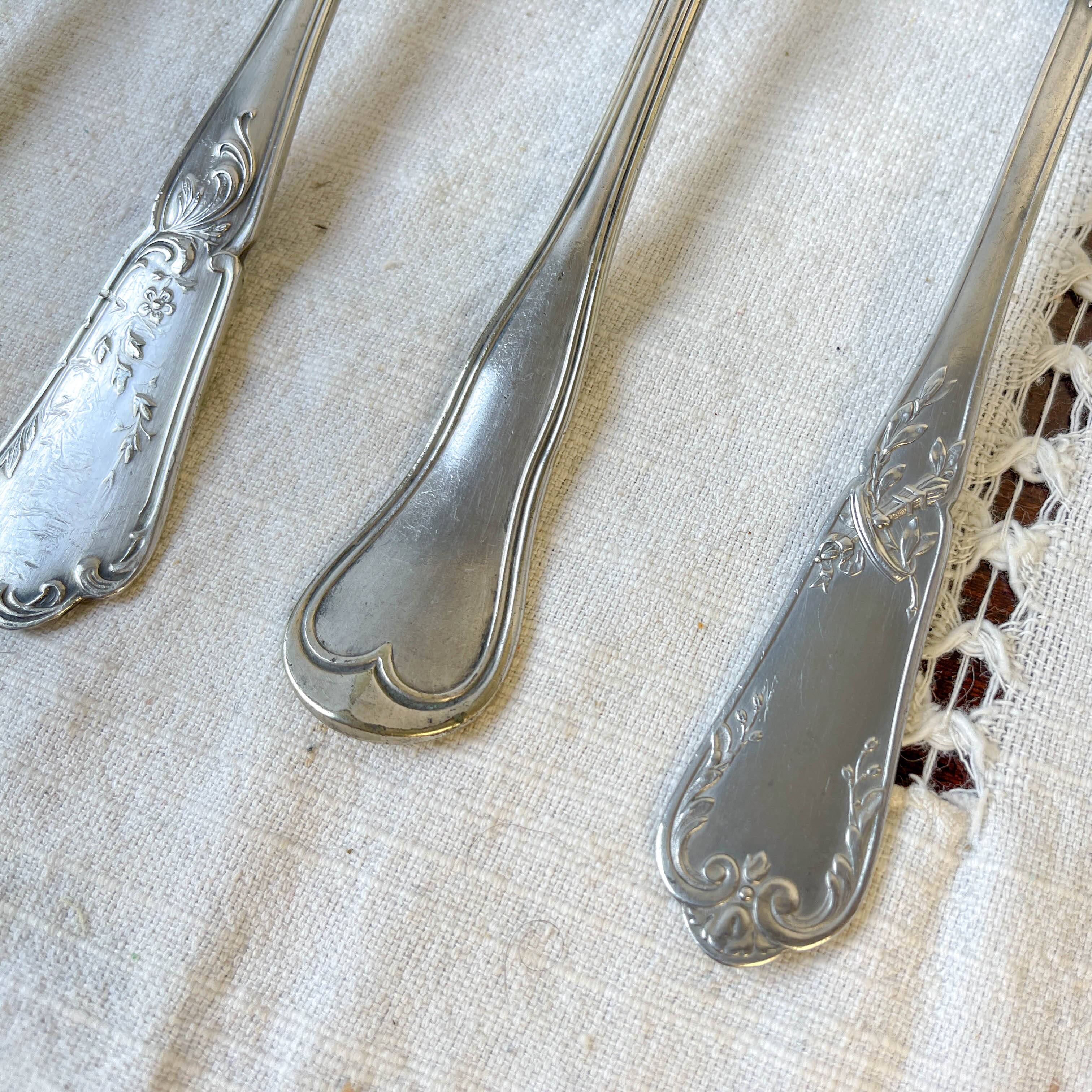 Set of 6 mismatched vintage soup spoons