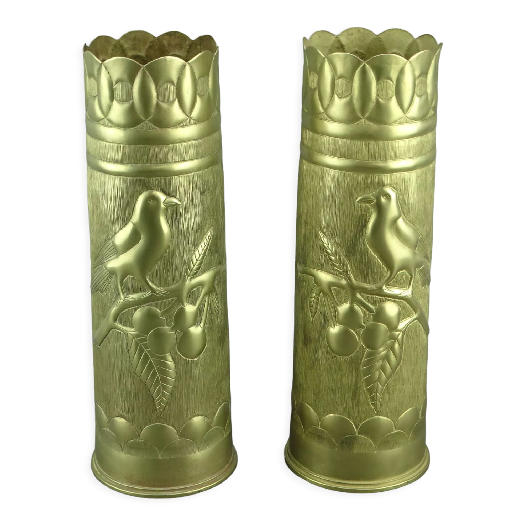 Pair of shell casings forming repulsed copper vases
