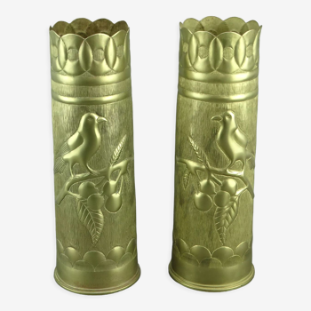 Pair of shell casings forming repulsed copper vases