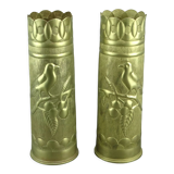 Pair of shell casings forming repulsed copper vases