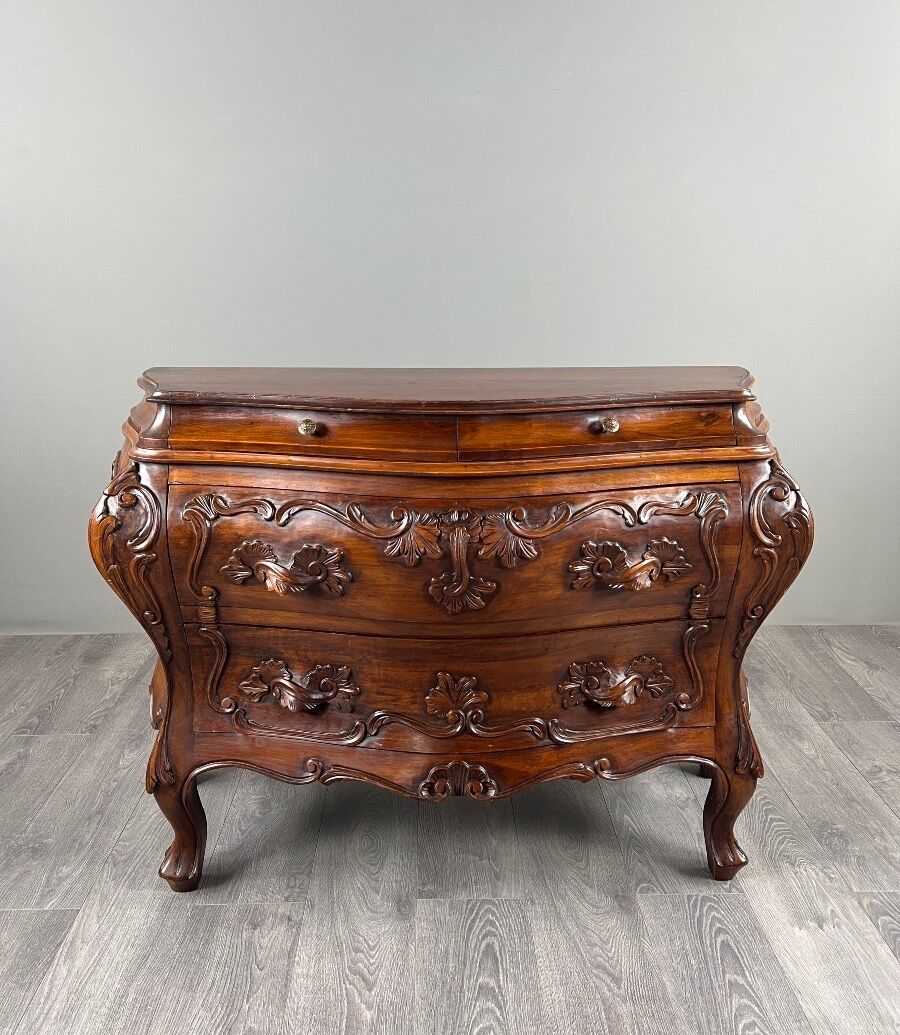 Curved commode in the Louis XV style, carved wood, 19th century.