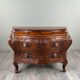 Curved commode in the Louis XV style, carved wood, 19th century.