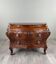 Curved commode in the Louis XV style, carved wood, 19th century.