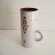 Old glazed terracotta carafe with signature