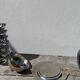 Silver-plated metal butter dish with knots