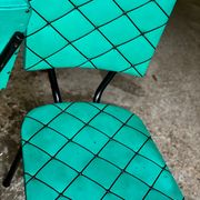 Paire de chaises métal et vinyle vert vintage 1950