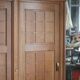 Vintage wooden wardrobe with sliding doors