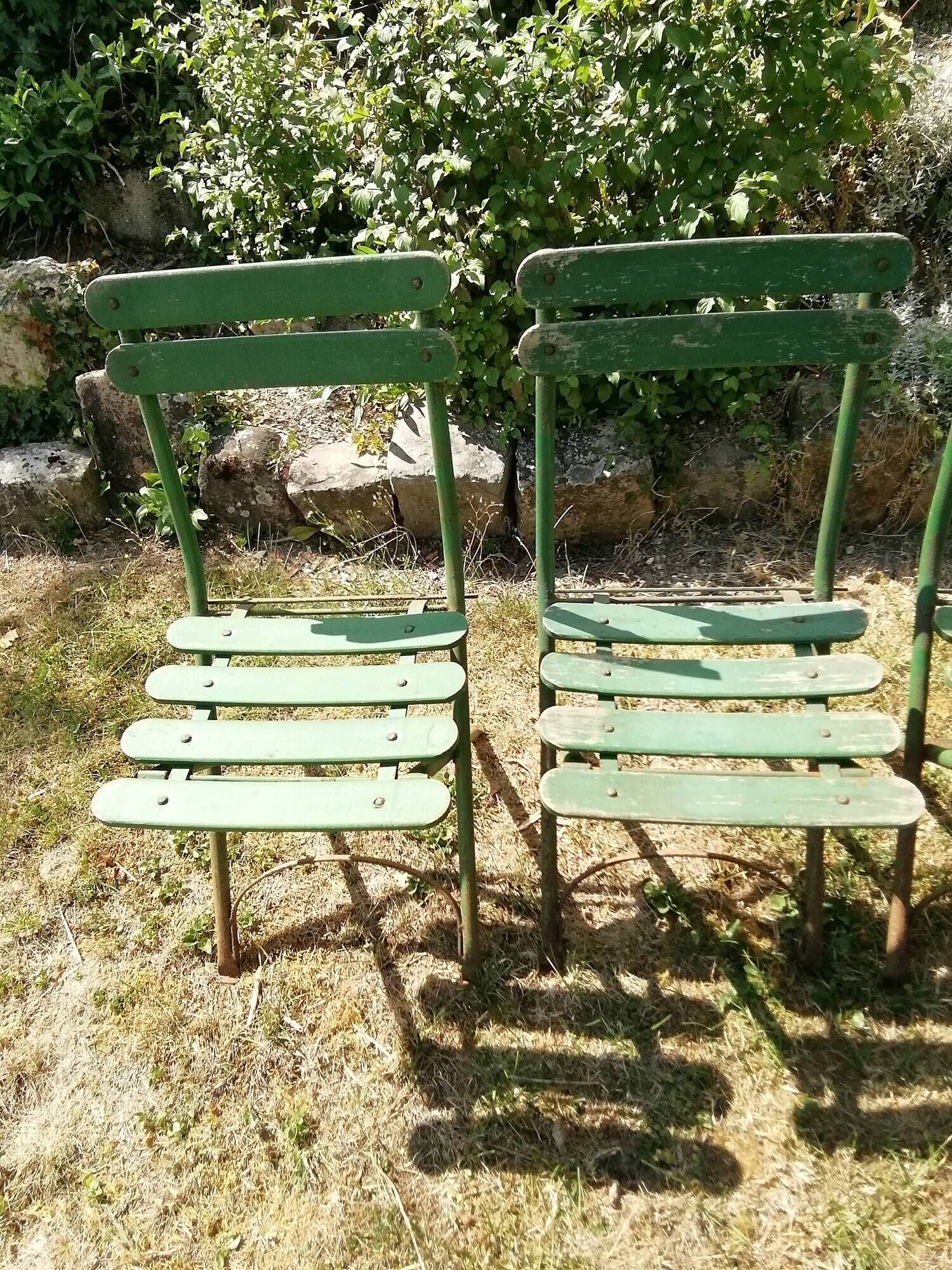 4 old iron and wood garden folding chairs