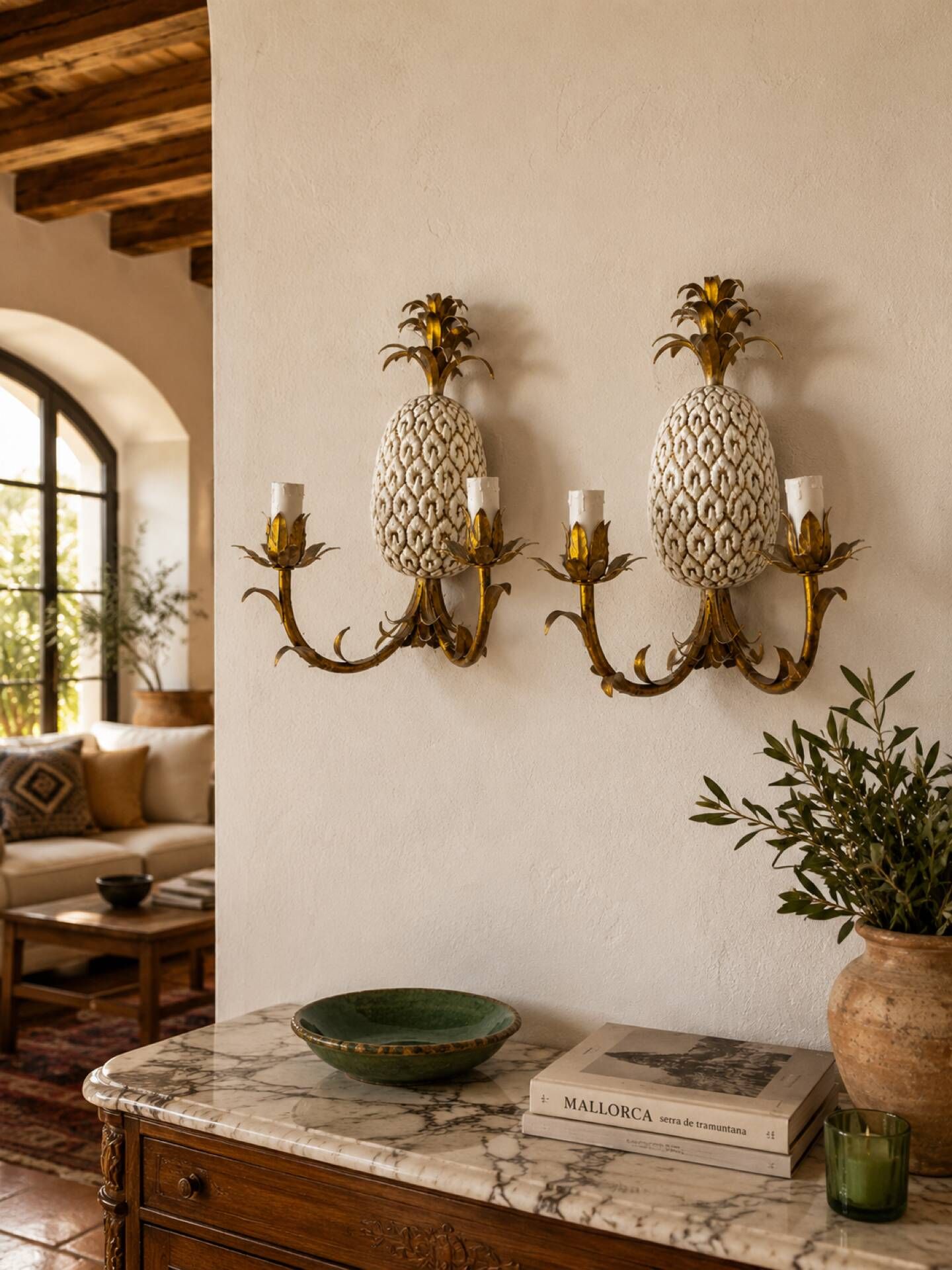Pair of pineapple wall lights, in the style of Maison Charles / Jansen, an