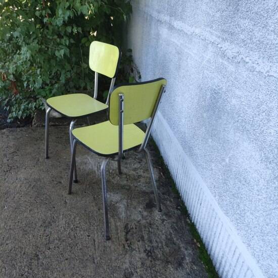 Pair of yellow formica chairs
