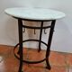 Iron pedestal table and marble top