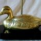 Lamp with brass duck on lacquered wood base