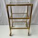 Étagère en laiton
