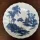 8 blue & white plates