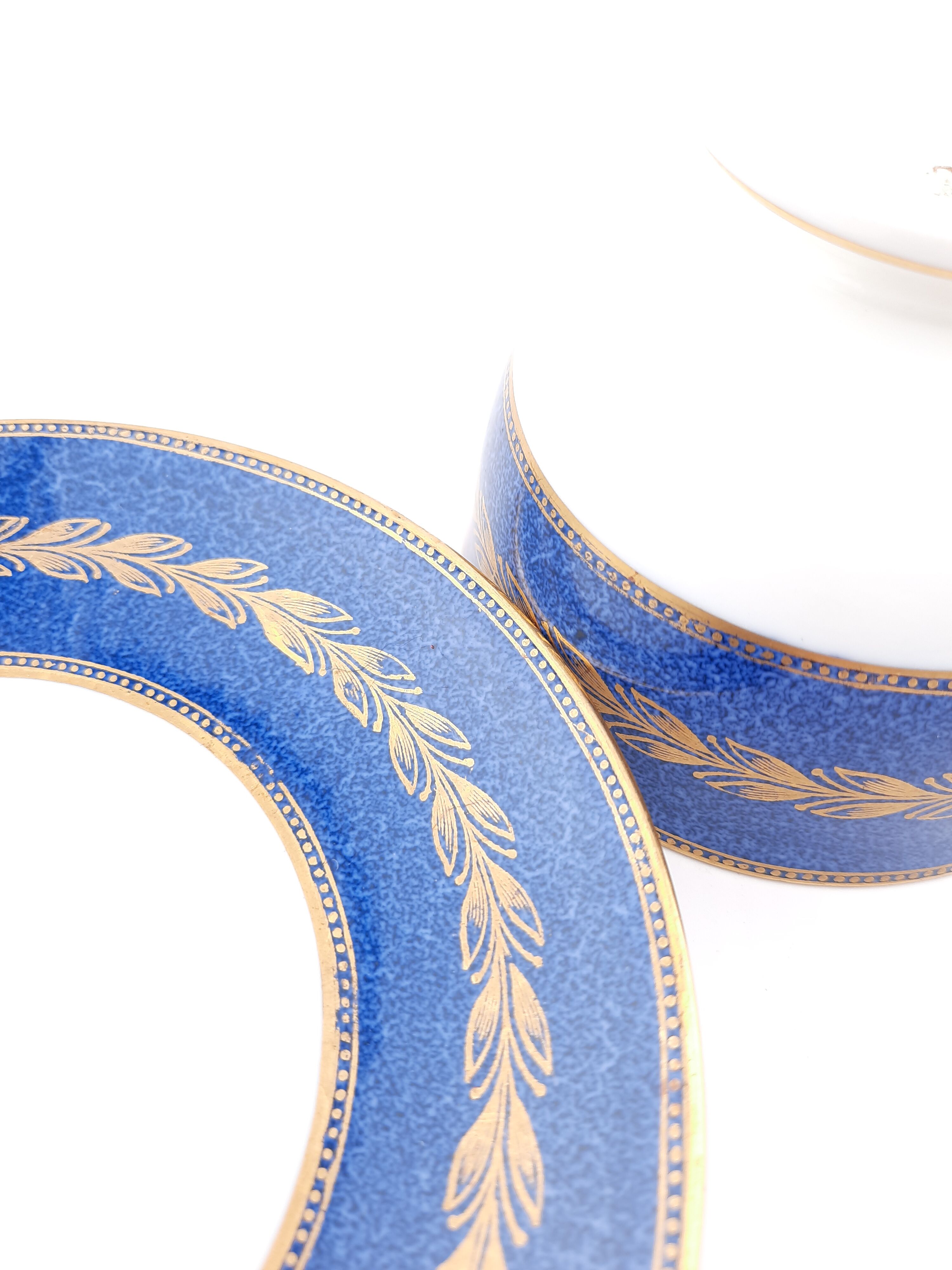 Antique Wedgwood teacup and saucer, bone china. Powder blue and gold English footed cup and saucer,