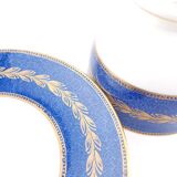 Antique Wedgwood teacup and saucer, bone china. Powder blue and gold English footed cup and saucer,