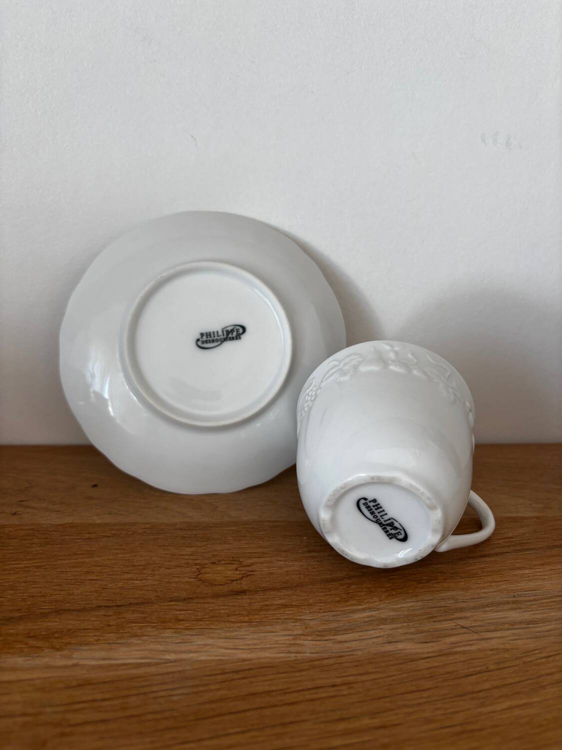 5 cups, 4 saucers and a creamer in Philippe Deshoulières porcelain