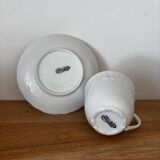 5 cups, 4 saucers and a creamer in Philippe Deshoulières porcelain