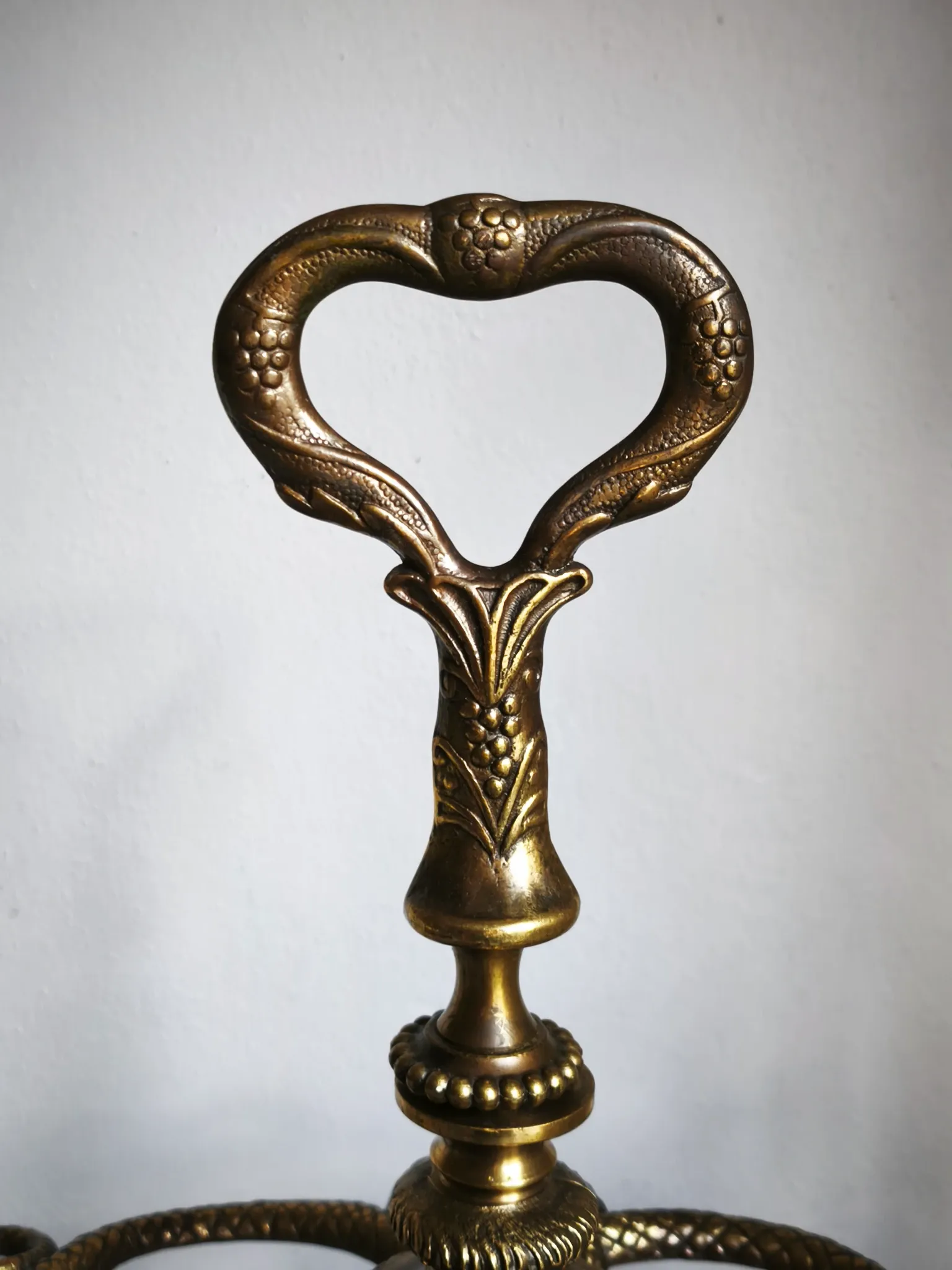 Italian brass umbrella stand, Art Nouveau style, with putti.