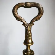 Italian brass umbrella stand, Art Nouveau style, with putti.