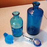 Set of two blue glass bottles