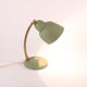 Flexible brass and green metal bedside lamp, 1950s.