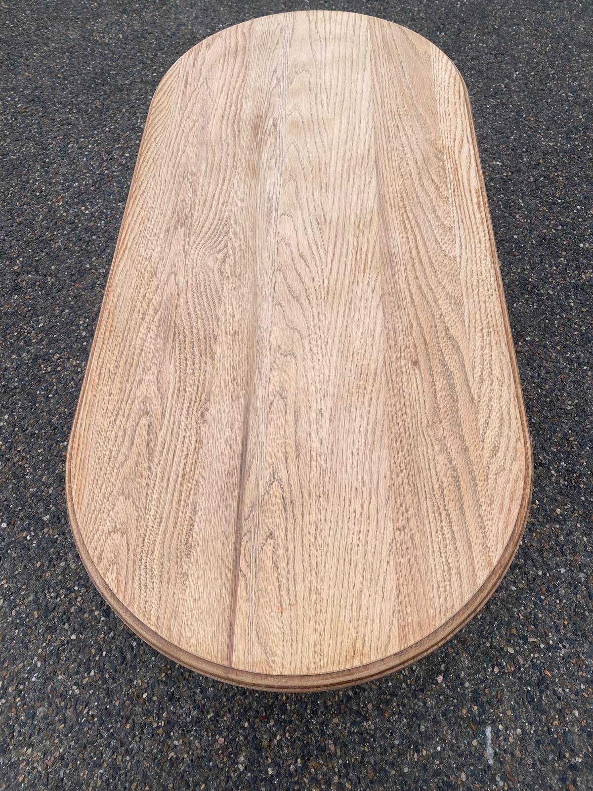 Renovated oval farmhouse or monstera coffee table in raw solid wood