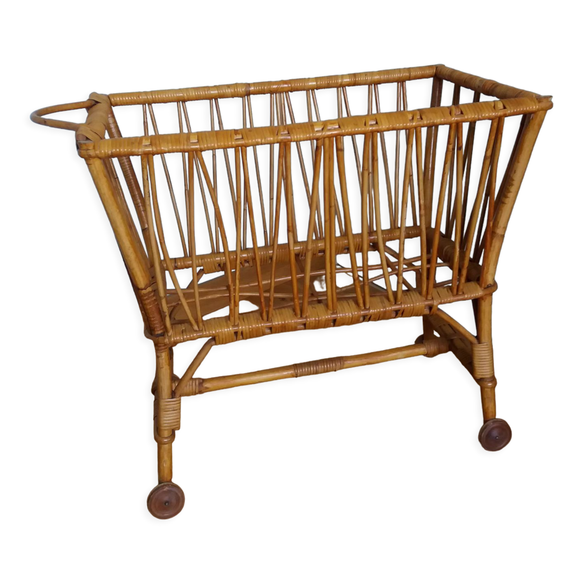 Rattan wicker cradle on wooden wheels