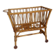 Rattan wicker cradle on wooden wheels
