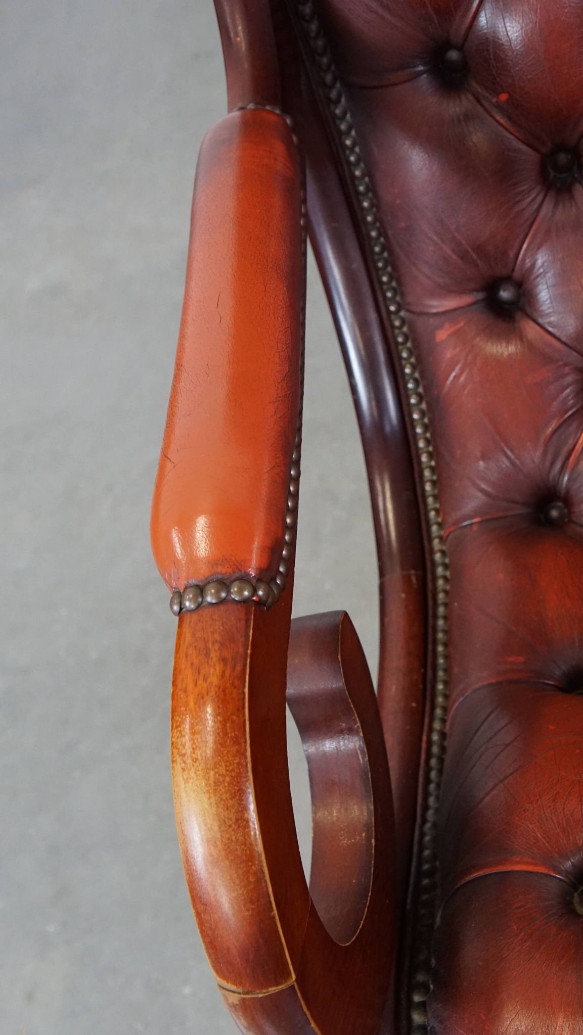Red cowhide leather English Chesterfield armchair combined with wood