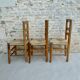 Trio of wooden chairs and mulched seat