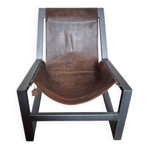 Chauffeuse en cuir brun,