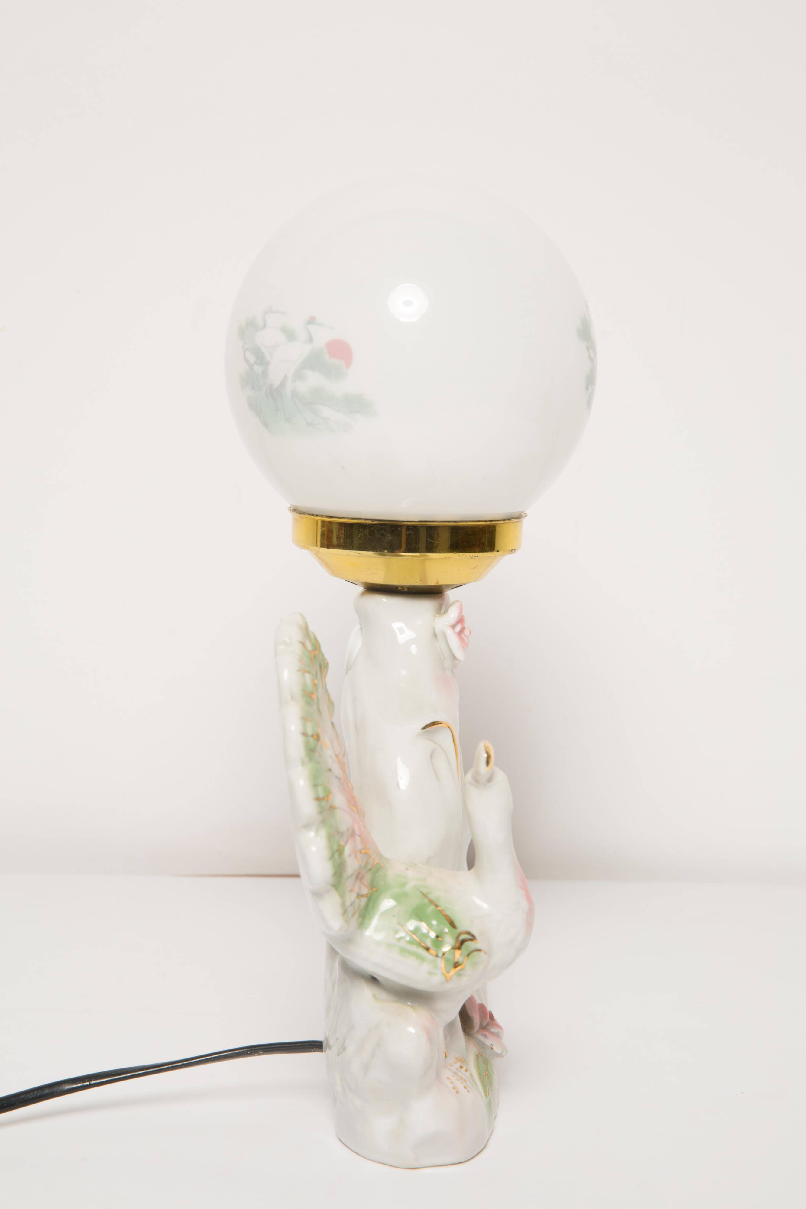 Mid-century white ceramic peacock table lamp, Europe, 1960s.