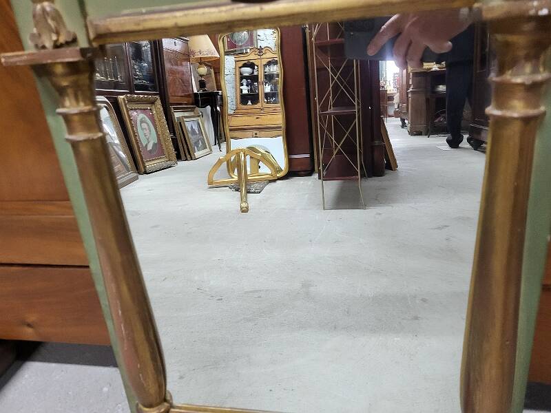 Empire style mirror in wood and gilding