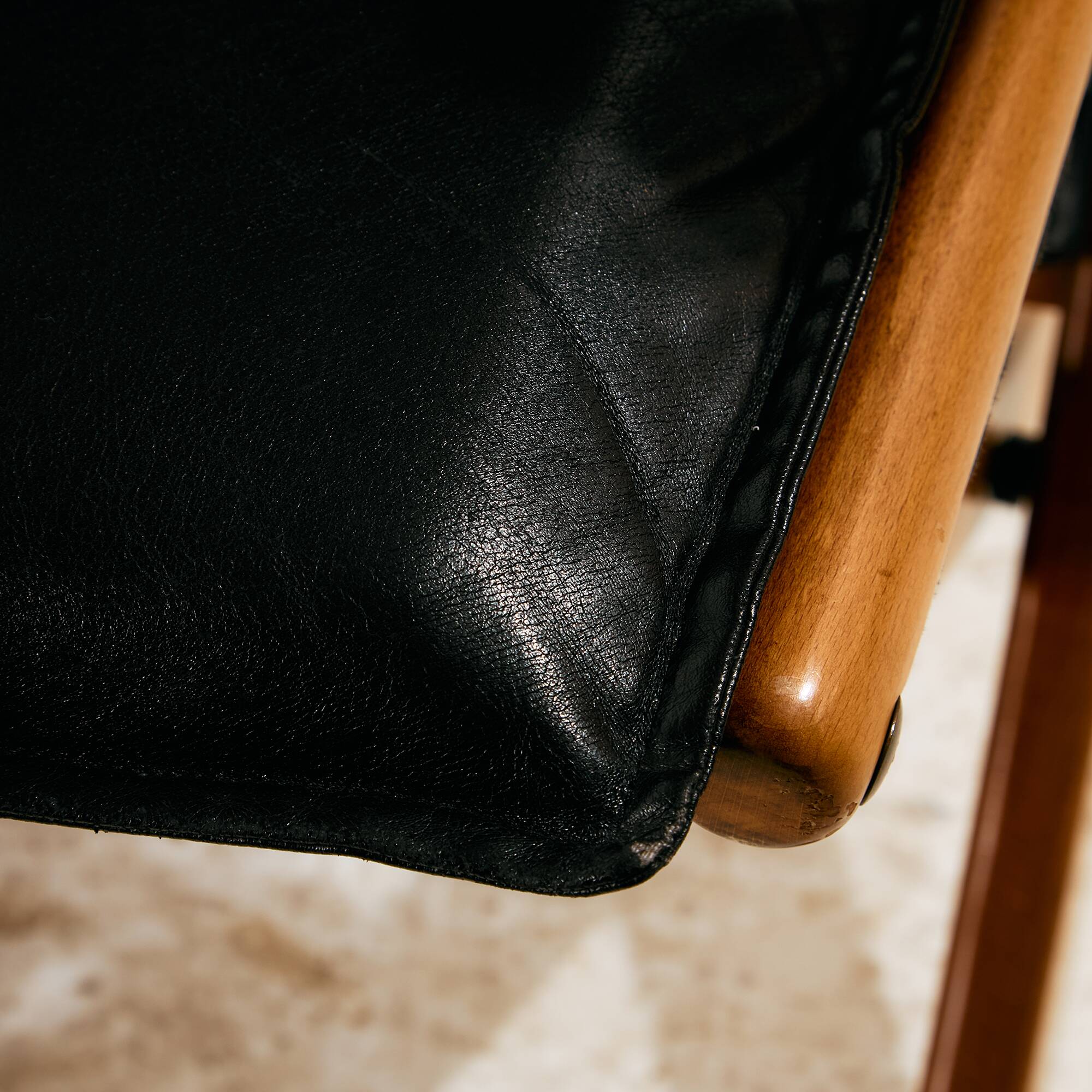 Beech armchair with leather upholstery