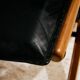 Beech armchair with leather upholstery