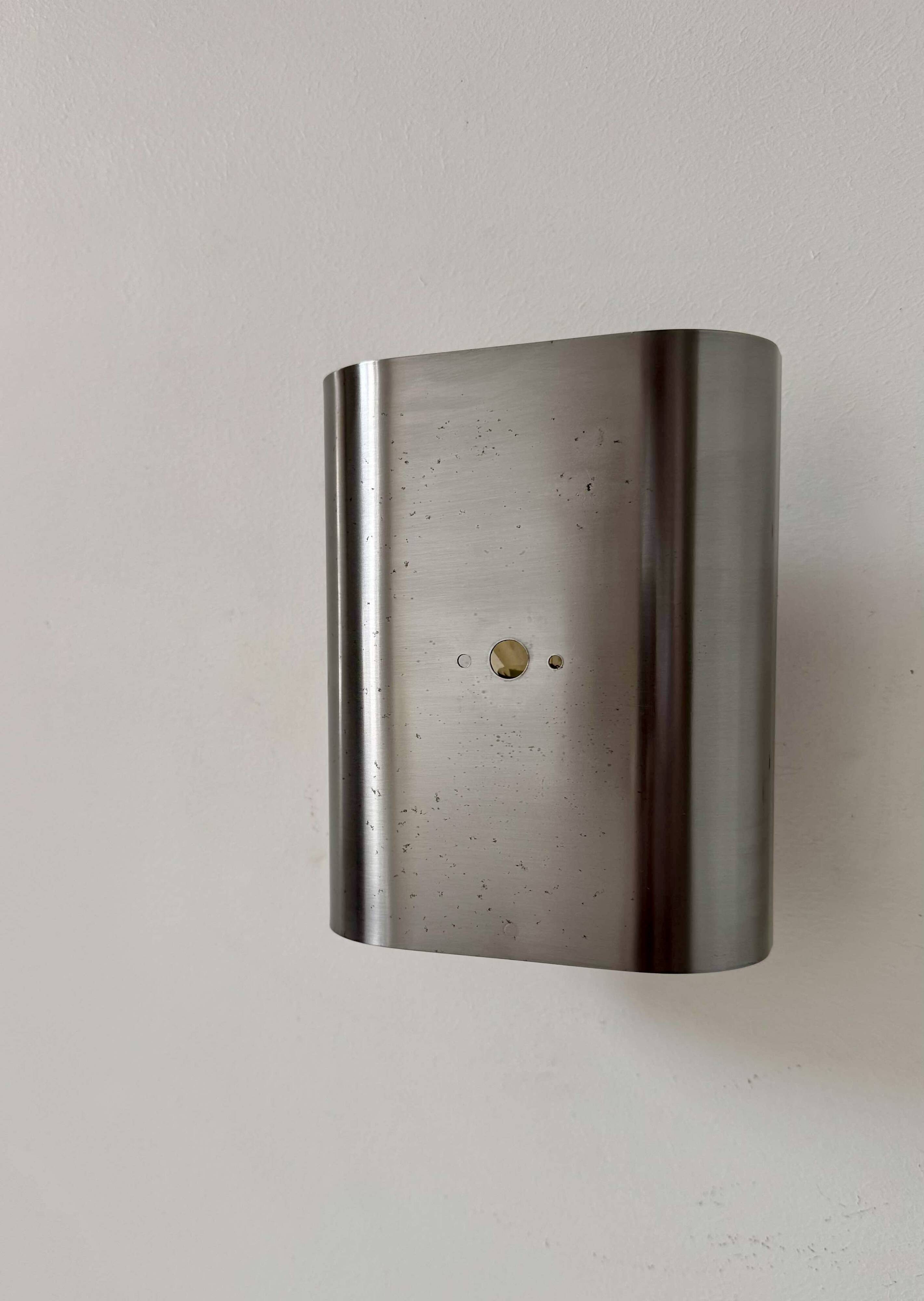 Vintage curved brushed metal wall light, France 1970