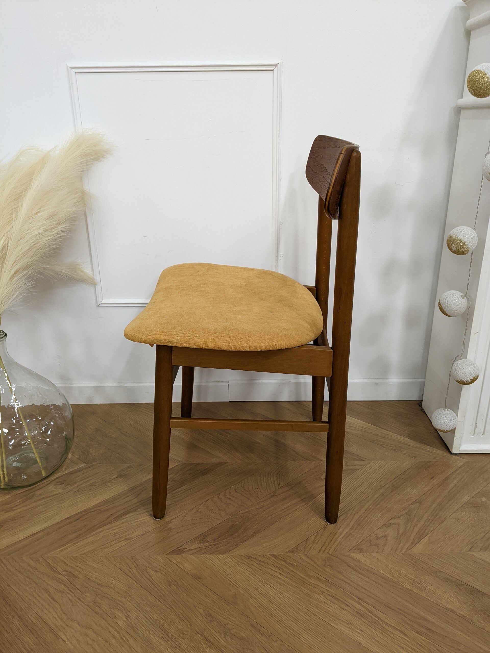 Scandinavian chair with mustard yellow fabric