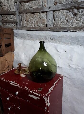 Dark green demijohn